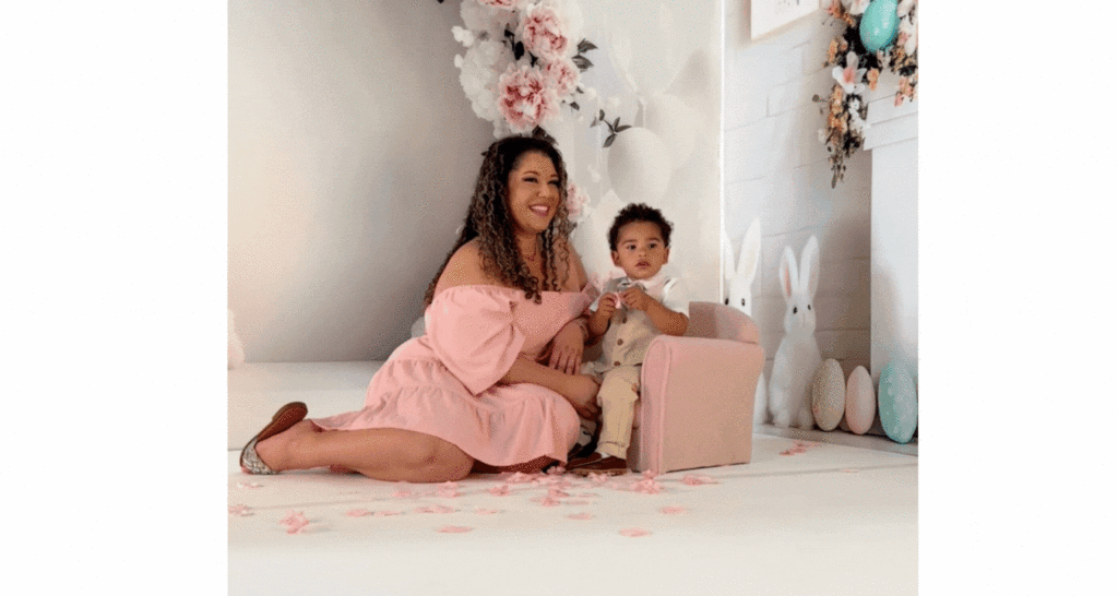 photography assistant helping mommy and child avoid temper tantrum during photo session in downtown orlando photography studio